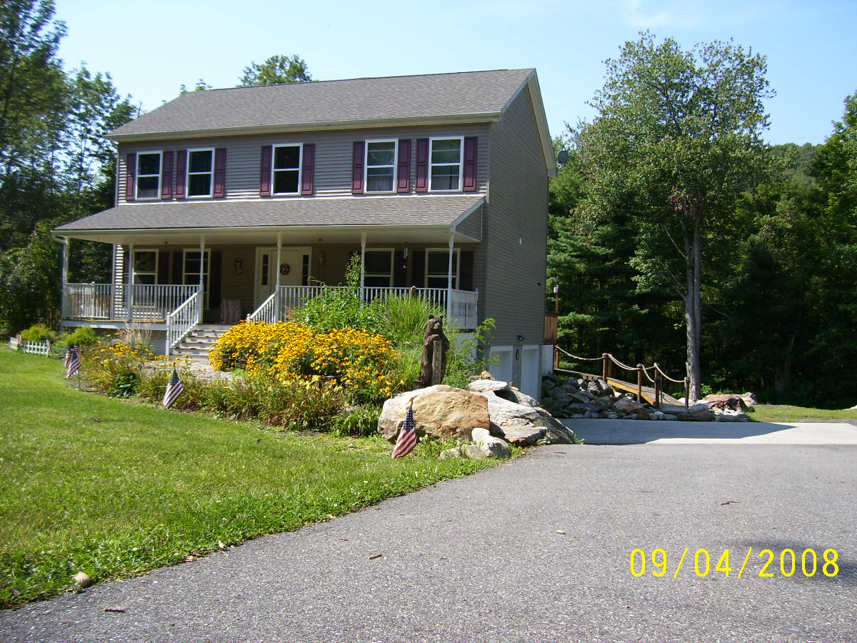 Almost new colonial surrounded by 170+ acres of private farm land